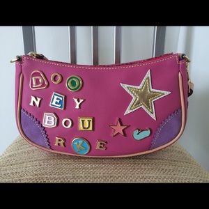Dooney and Bourke pink crescent purse